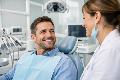 Dentist consulting with patient about crowns