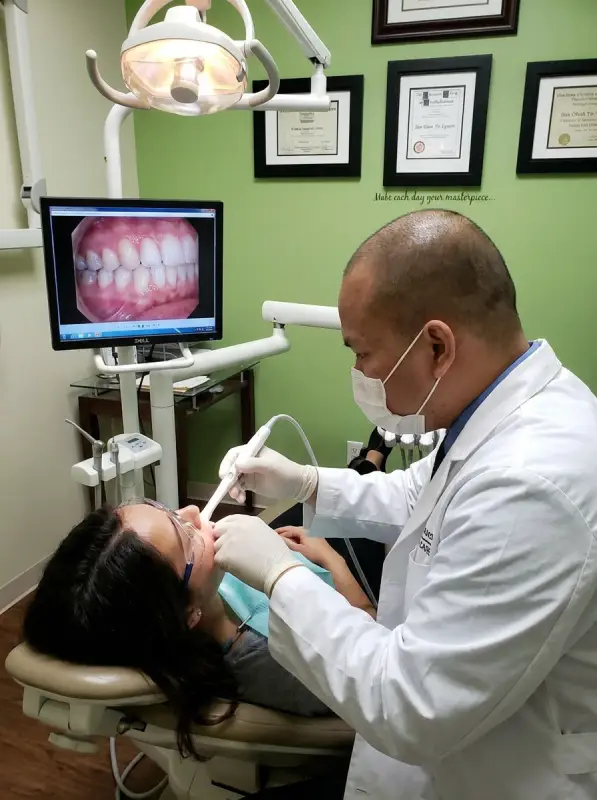 Periodontal evaluation with intraoral camera imaging before dental bridge treatment in Murrieta