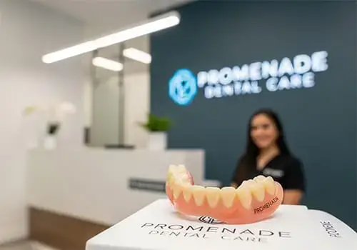 Custom partial denture used to replace several missing teeth for an older adult patient in Murrieta, CA